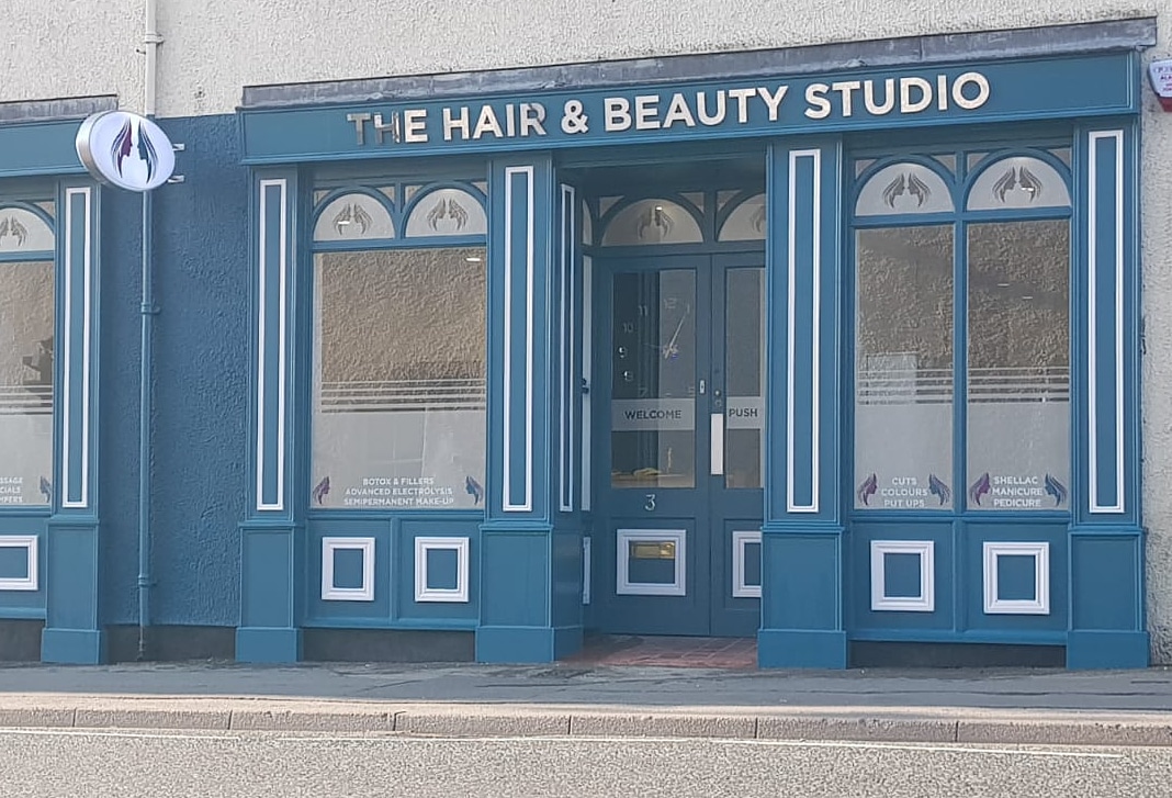 The navy shopfront of The Hair & Beauty Studio on Blackhall Road