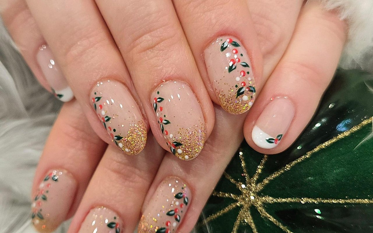 Gold glitter tips with hand-painted holly